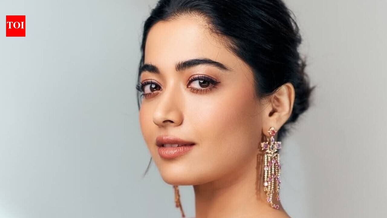 Rashmika Mandanna on a film set with a concerned expression