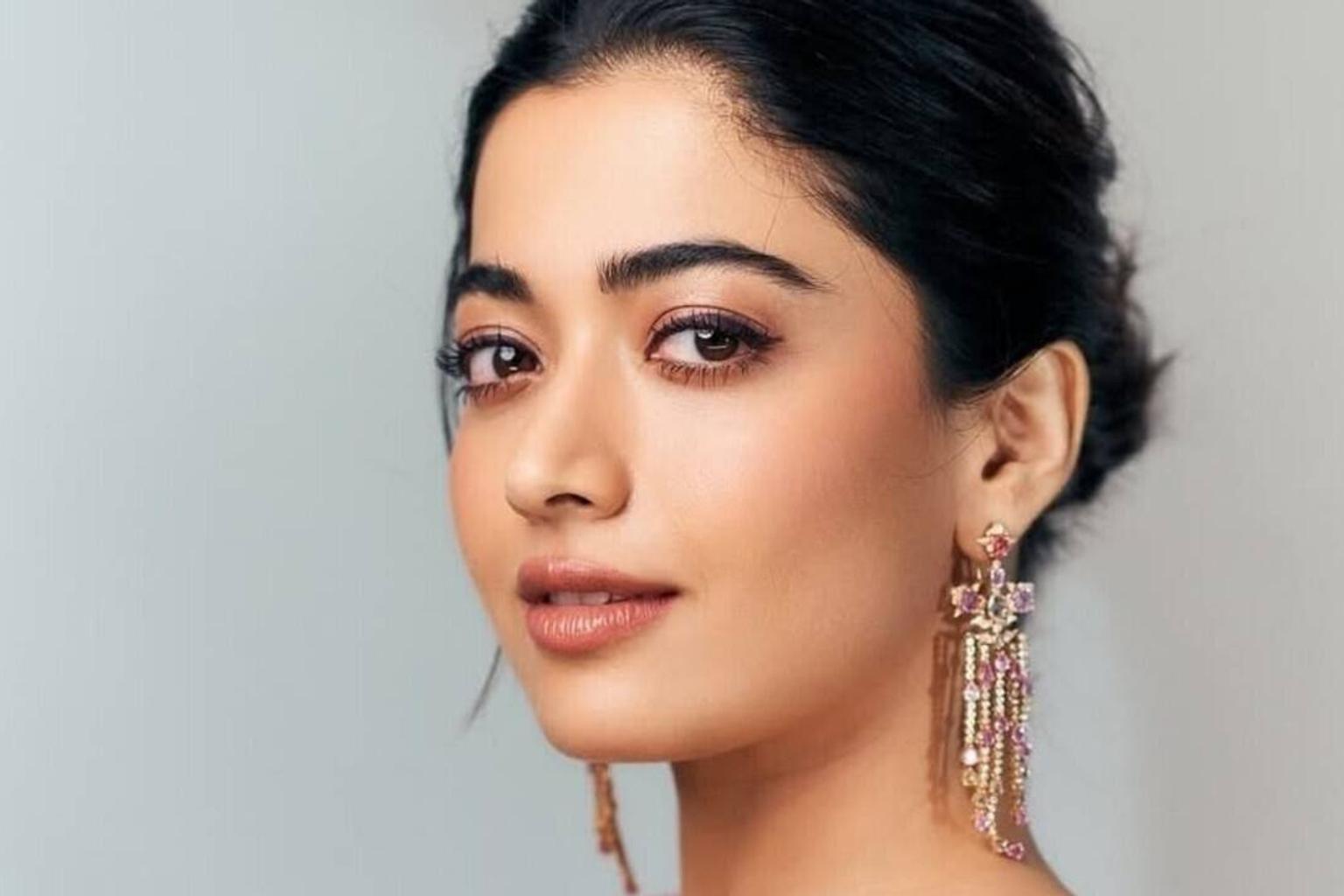 Rashmika Mandanna on a film set with a concerned expression