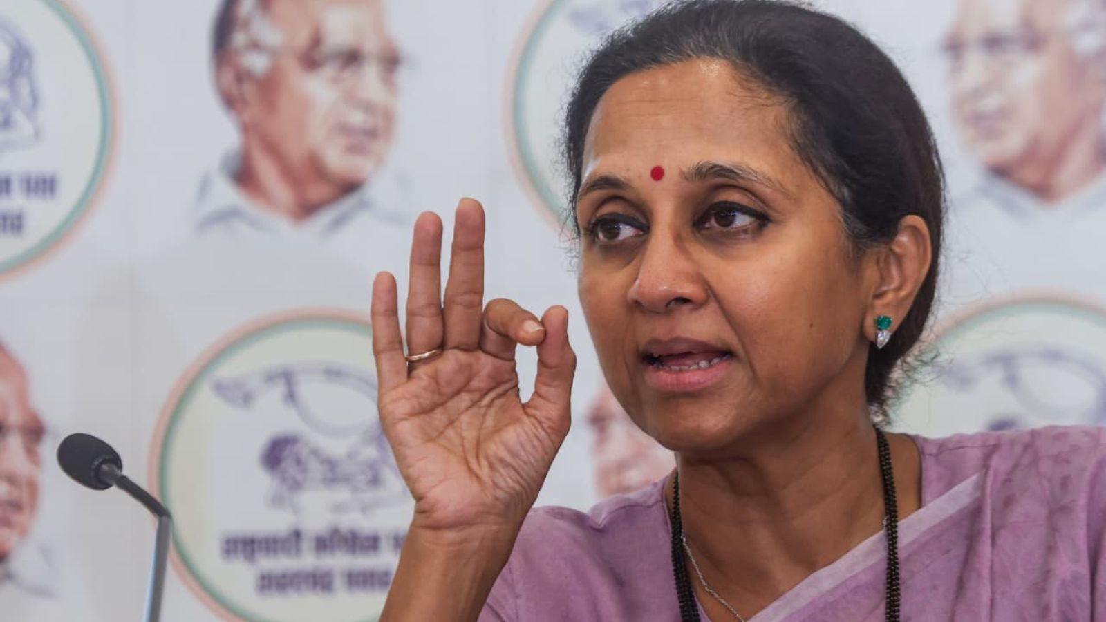 Supriya Sule speaking at a political event in India