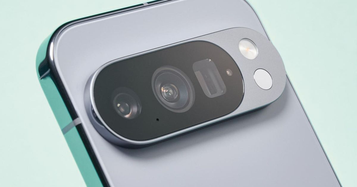 Google Pixel 11 smartphone with person holding it