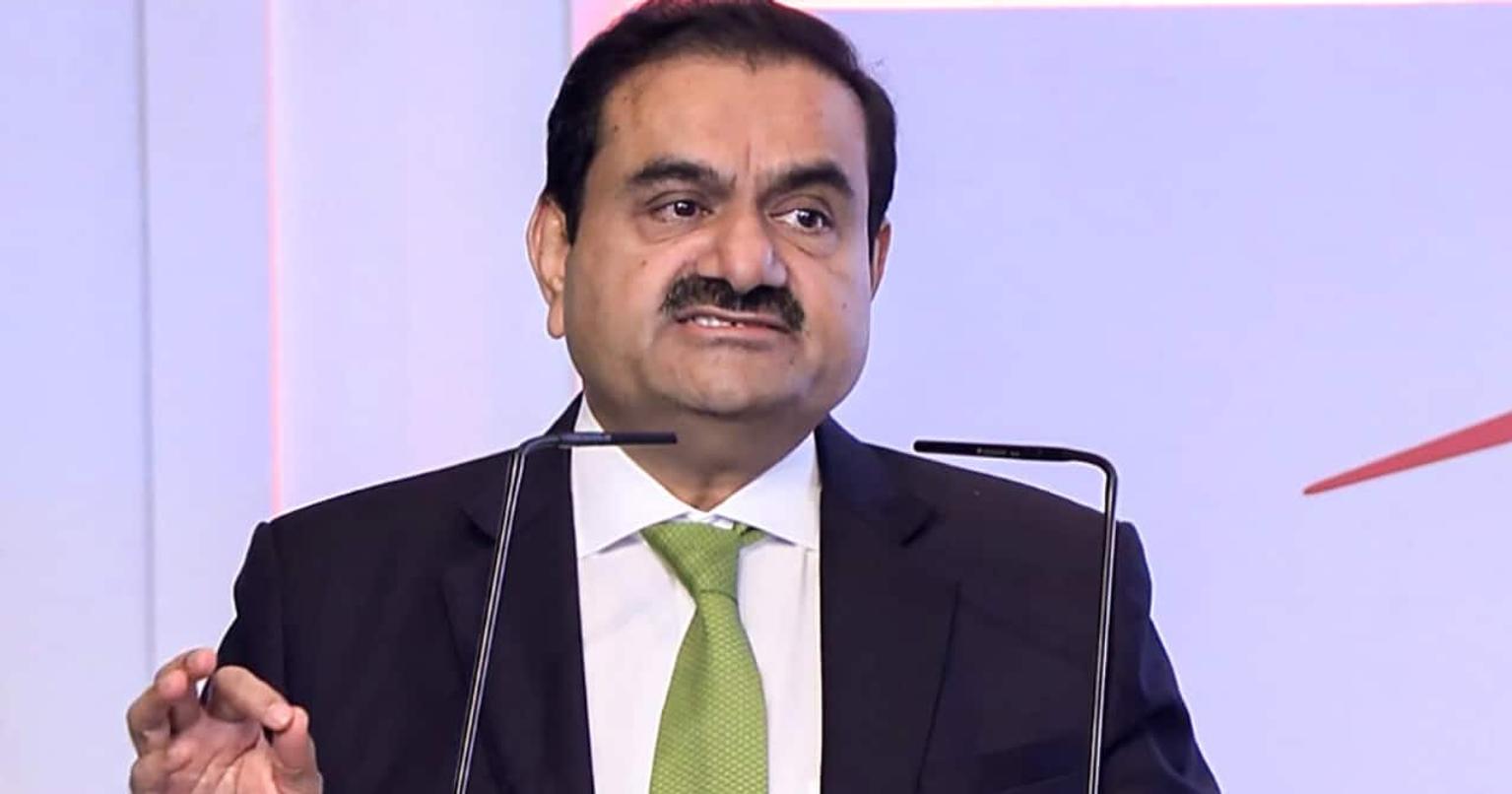 Adani family members in a business meeting, discussing real estate projects