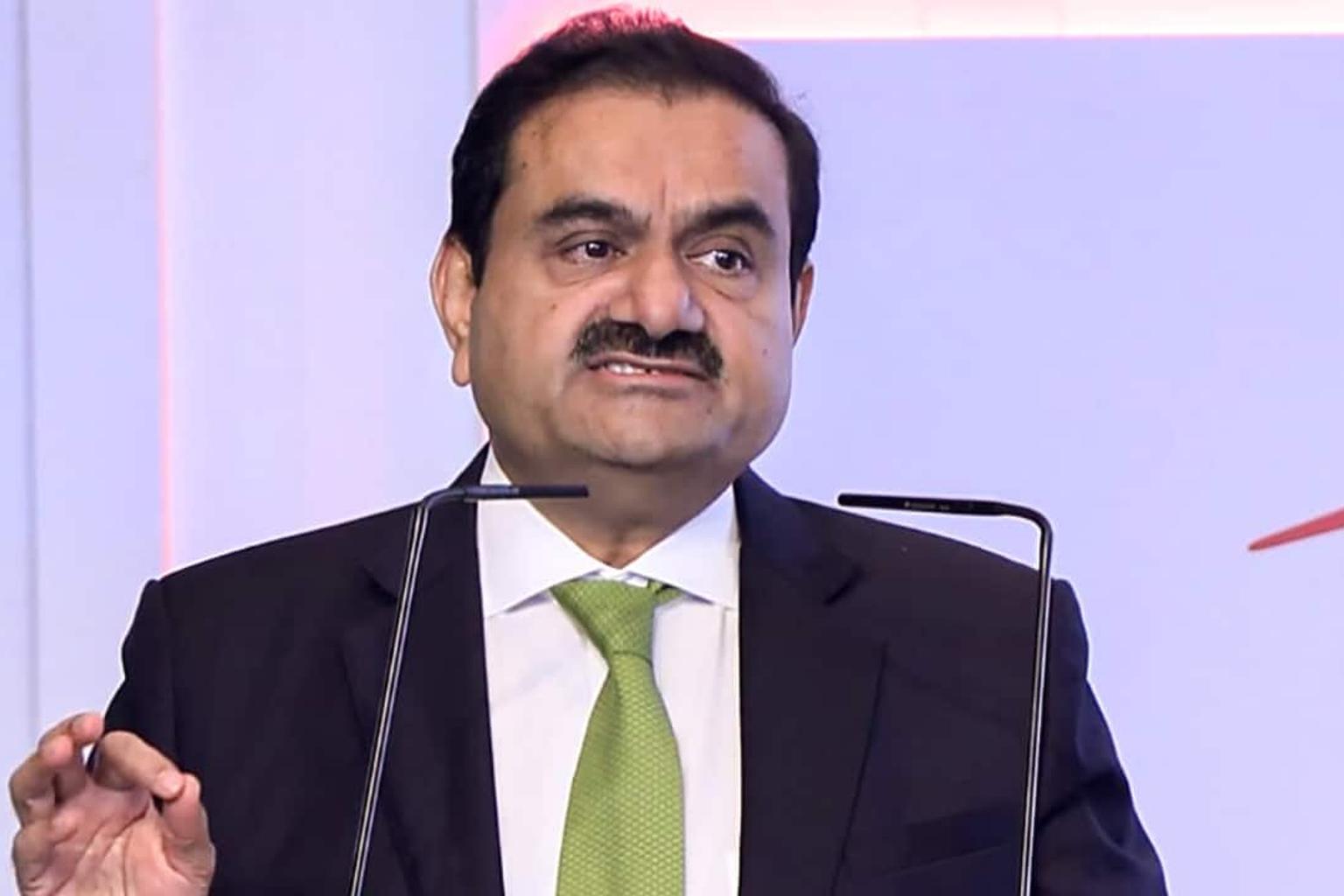 Adani family members in a business meeting, discussing real estate projects