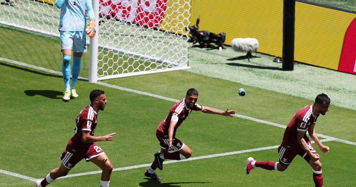 Qatar net late against Switzerland to secure historic first World Cup point