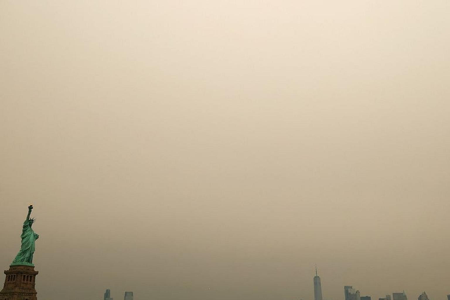 Soccer players on the field with haze in the background