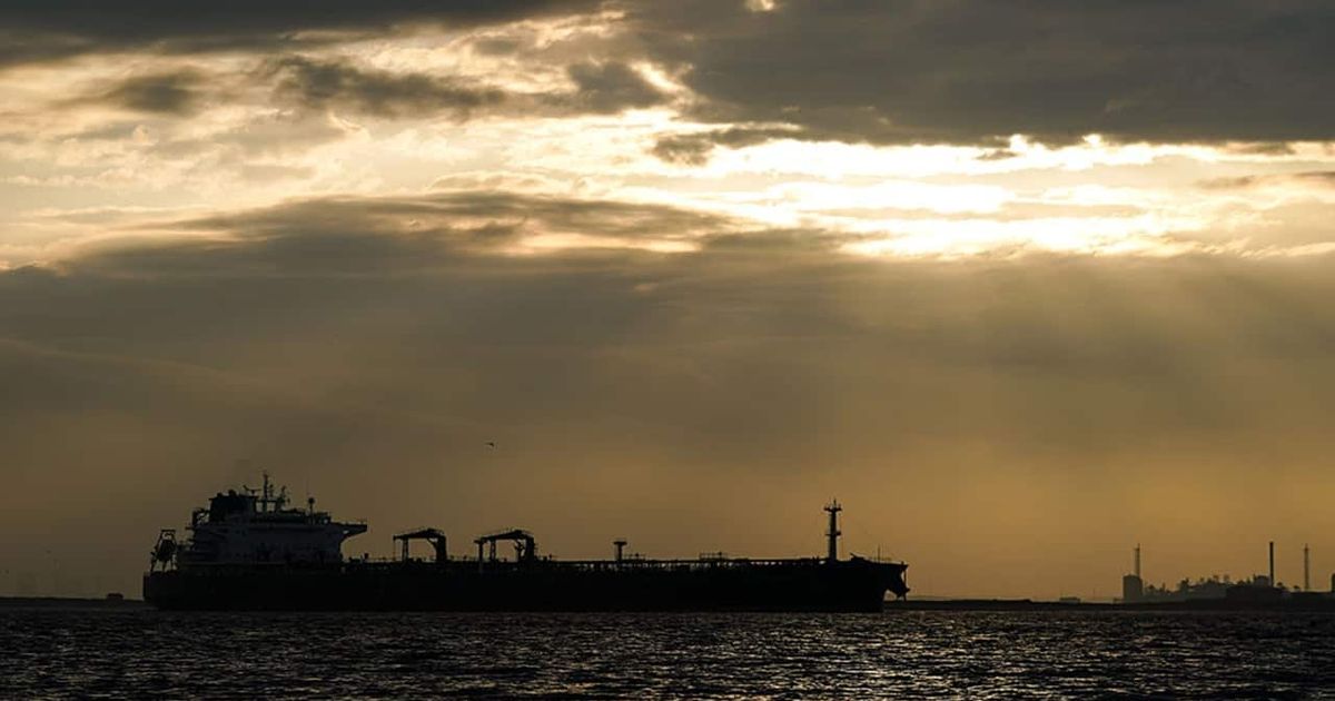 Cargo ship attacked in Strait of Hormuz as Iran warns vessels over transit routes