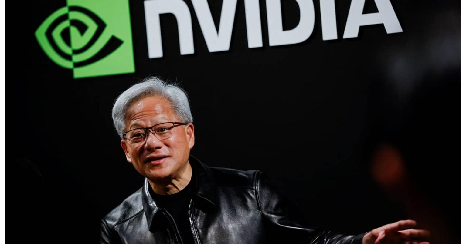 Nvidia and SK Group executives shaking hands at a press conference