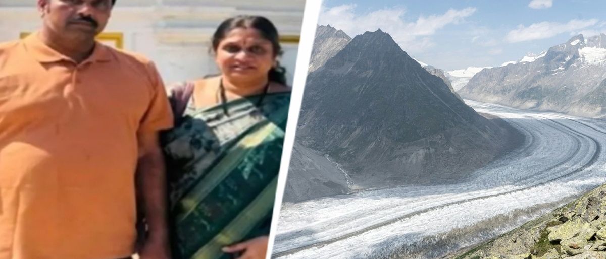 Couple on holiday in Switzerland with scenic mountains