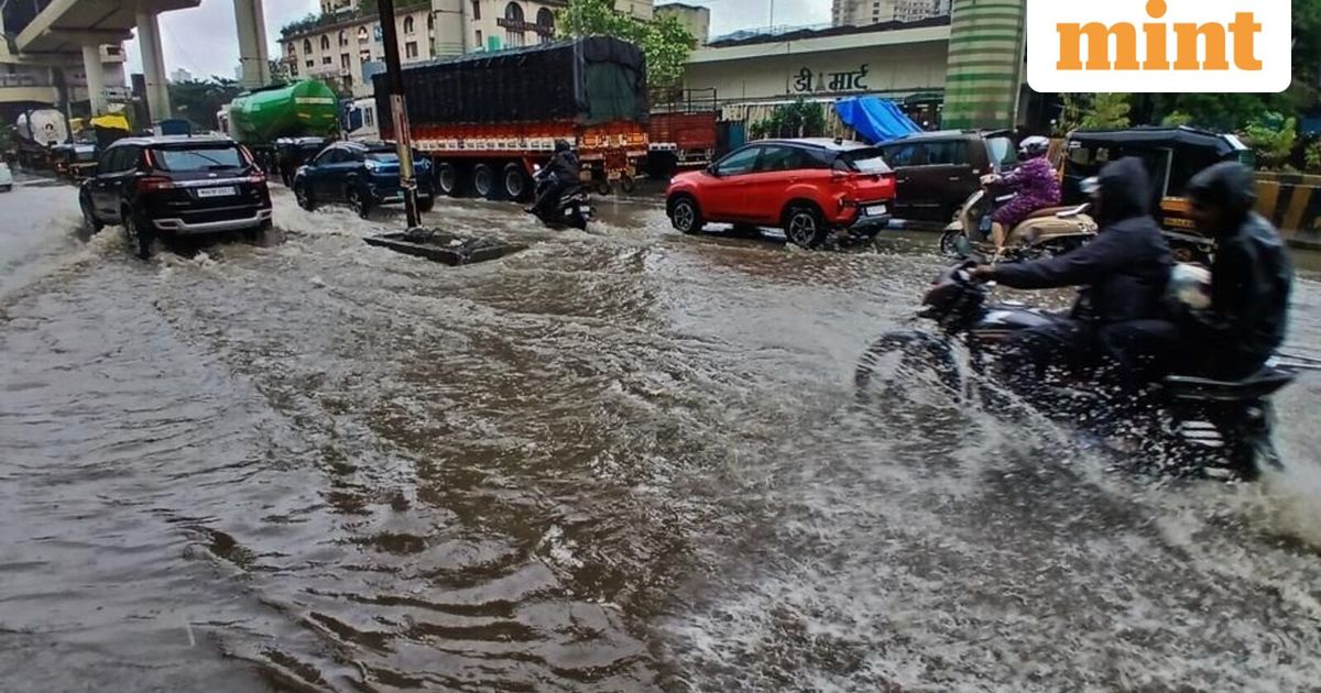Mumbai rains LIVE: Trains rescheduled, schools and colleges closed as heavy showers pound city amid IMD's red alert