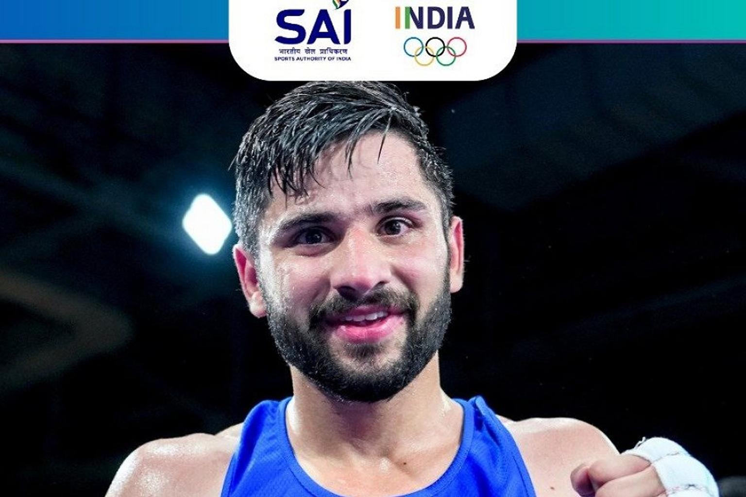 Indian boxers celebrating their victory at the Commonwealth Games