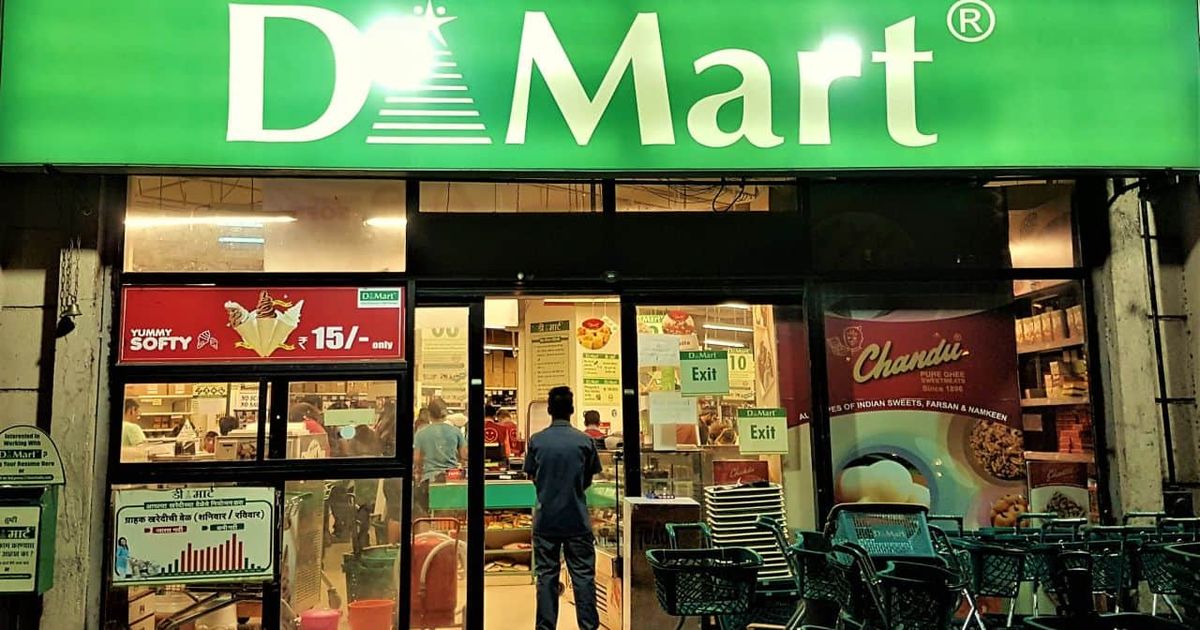 DMart store front with customers shopping
