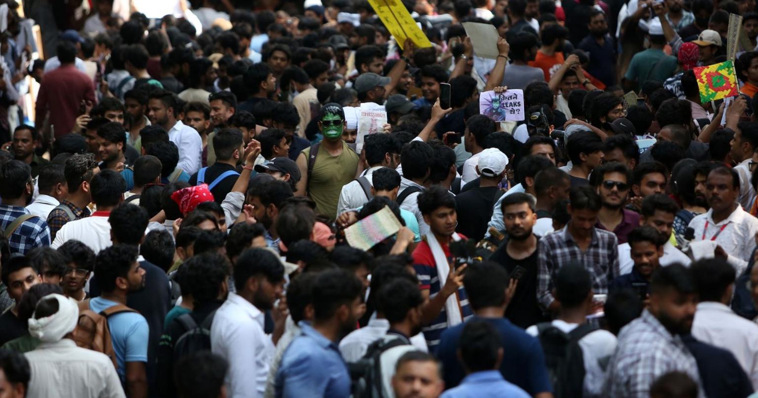 Students protesting on the streets with placards and banners