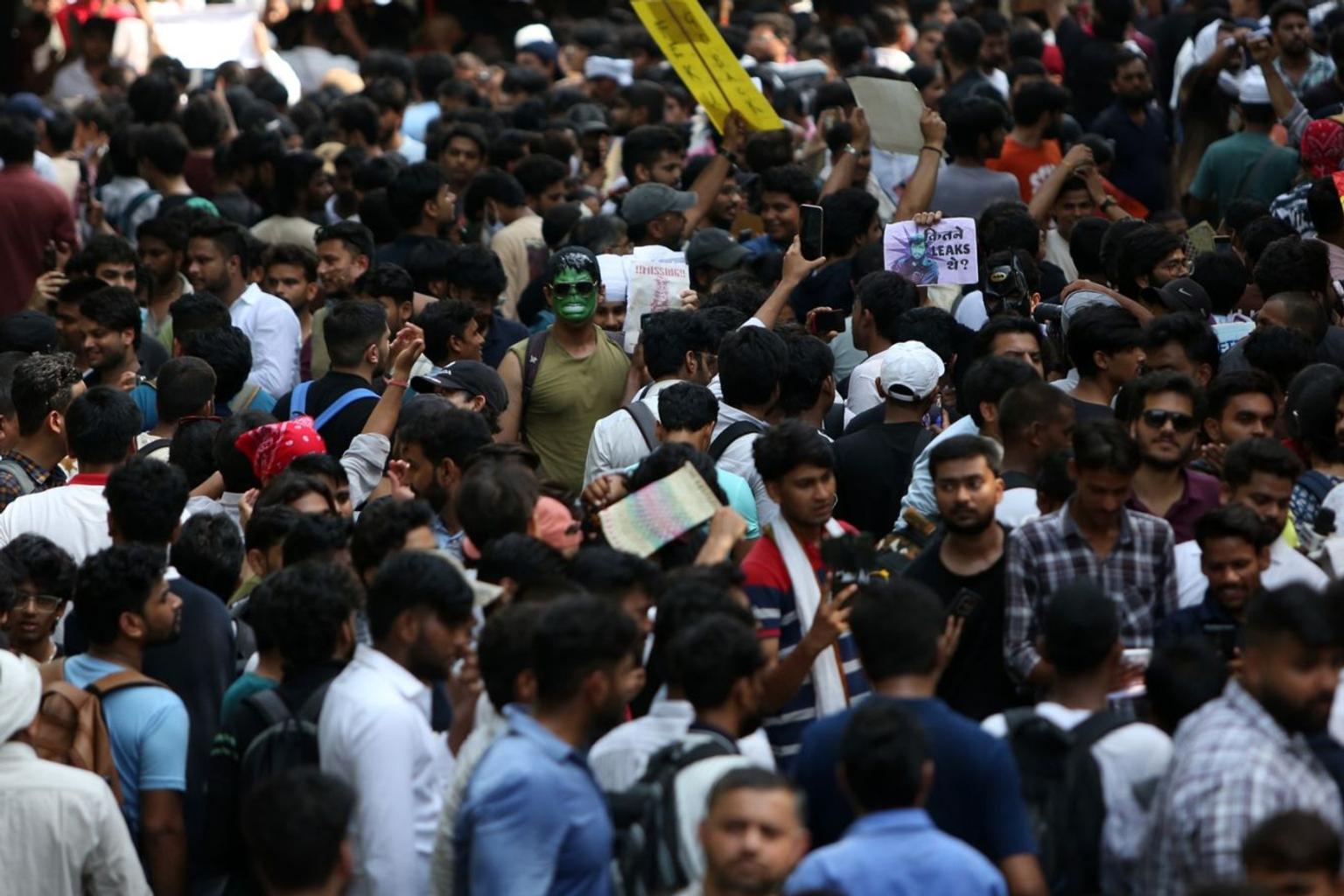Students protesting on the streets with placards and banners