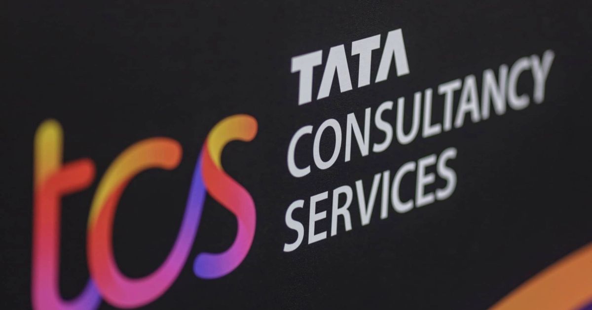 TCS office building with people working in the background