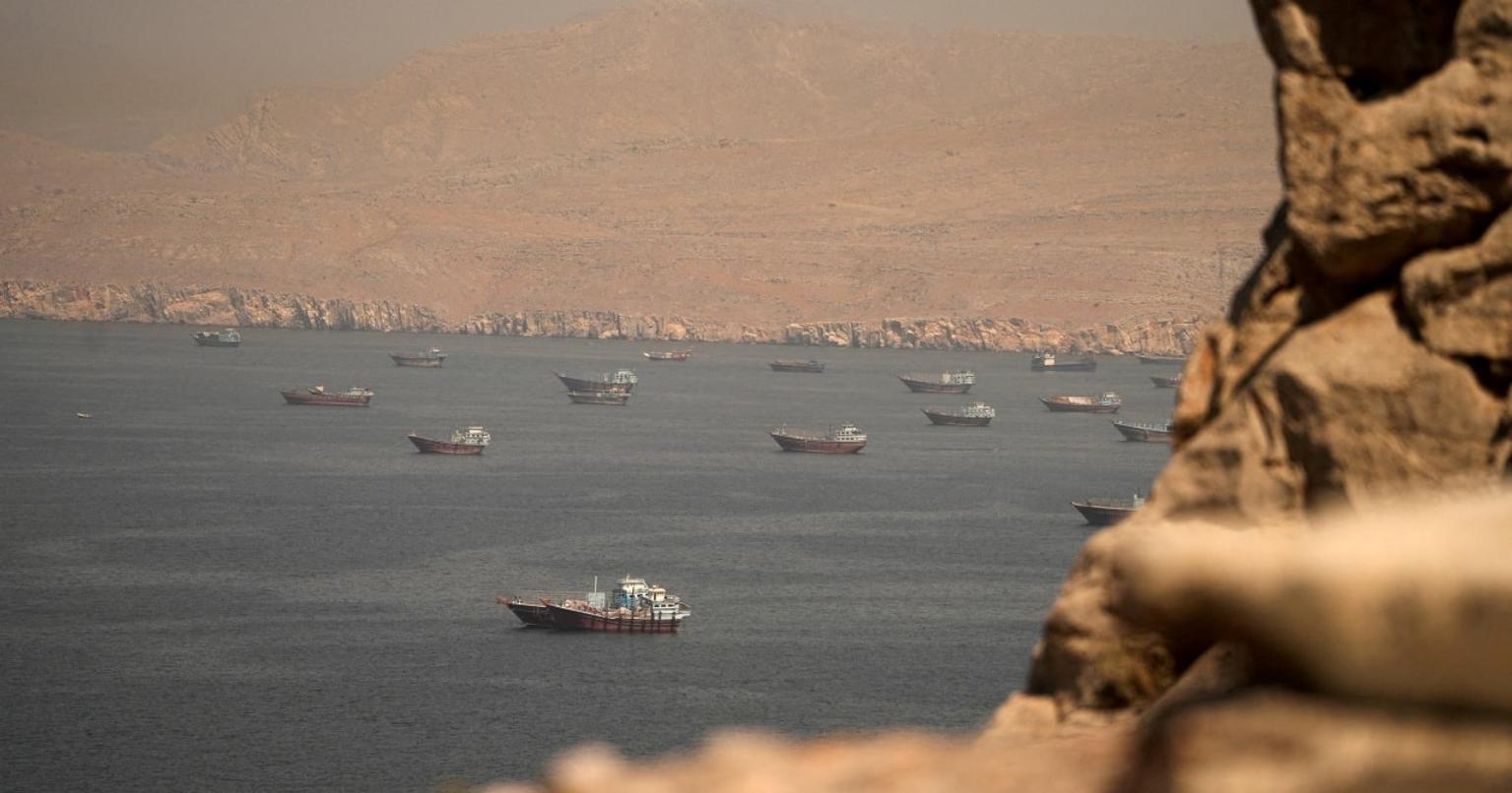 Map of the Strait of Hormuz with ships passing through