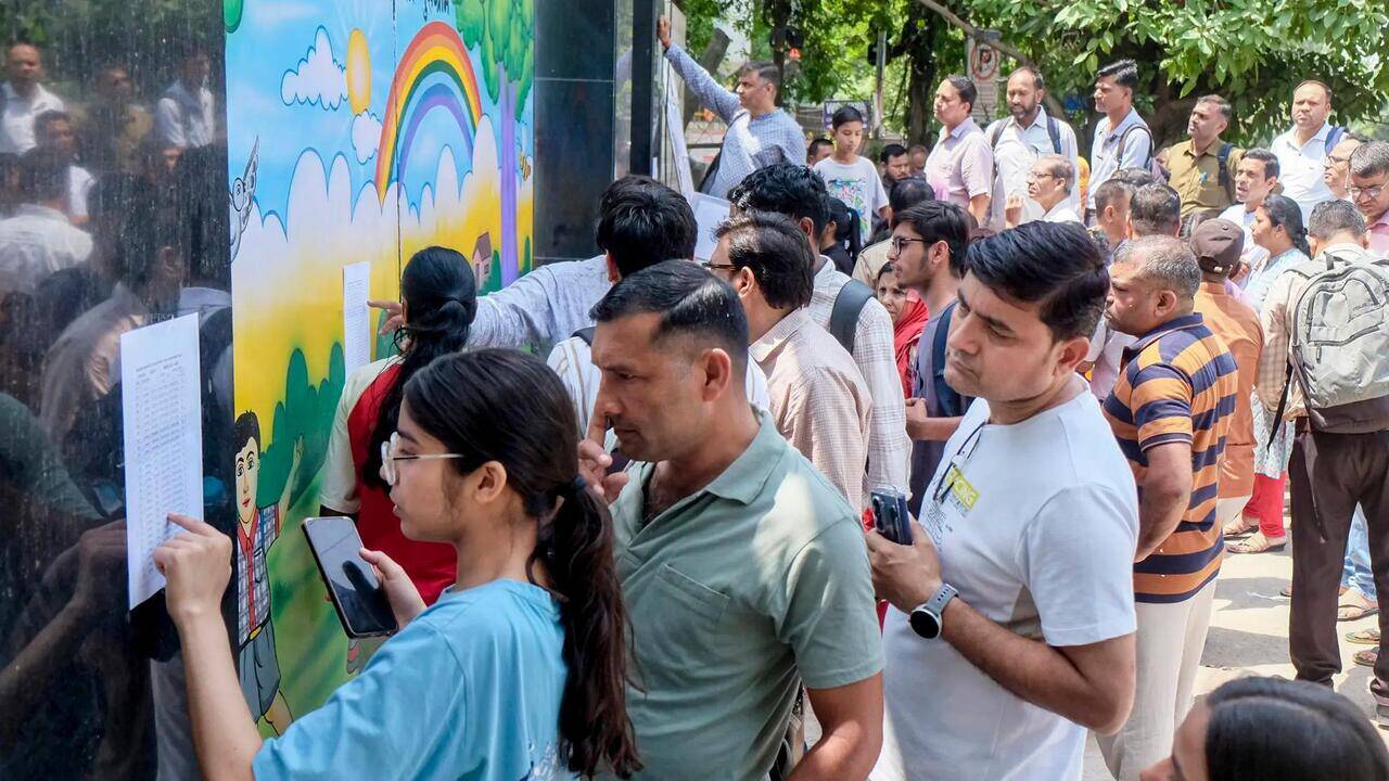 Students checking NEET UG 2026 results on their laptops