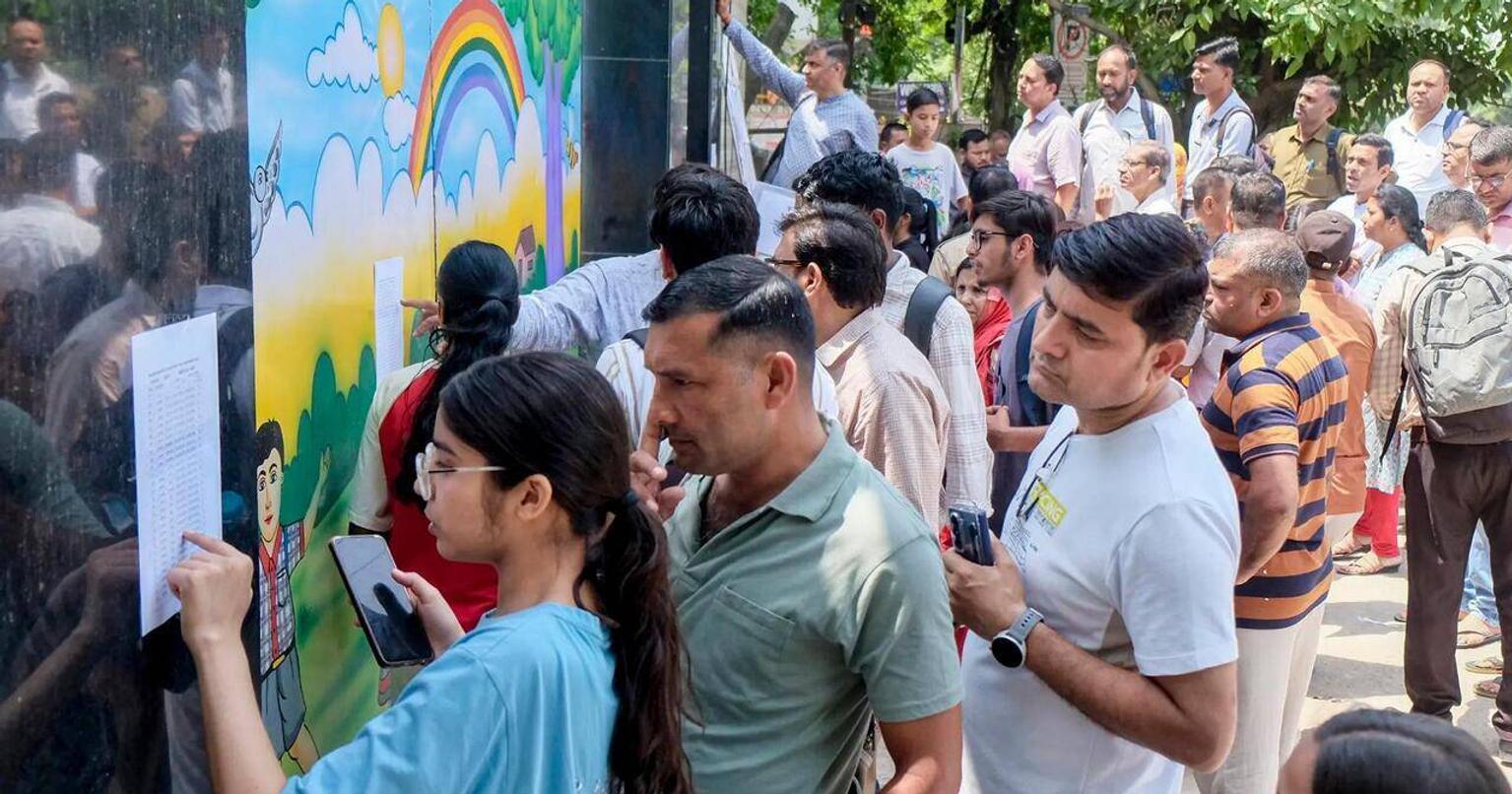 Students checking NEET UG 2026 results on their laptops