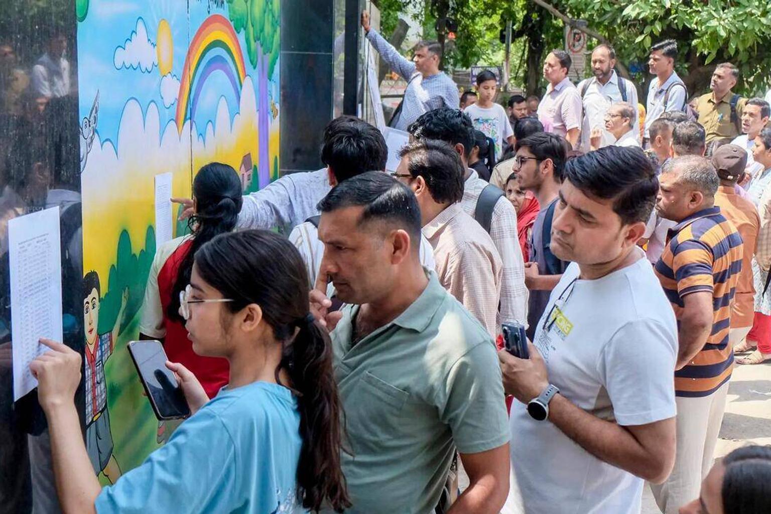 Students checking NEET UG 2026 results on their laptops
