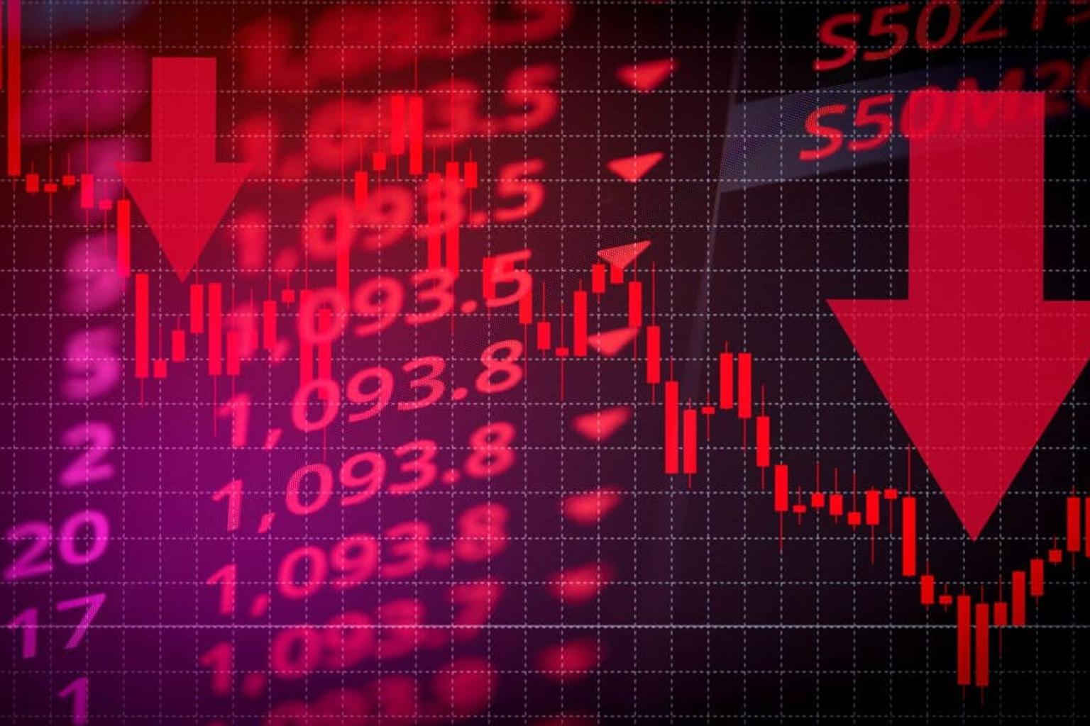 Indian stock market traders watching screens with concern