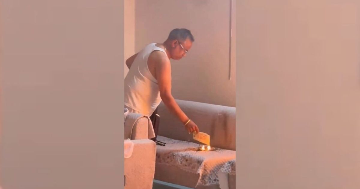 Days after fire at businessman's house, video shows him setting sofa ablaze
