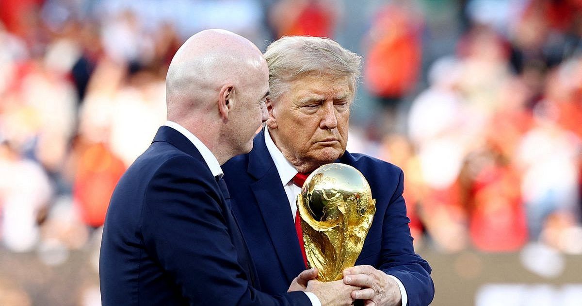 Donald Trump and Gianni Infantino on field during World Cup ceremony