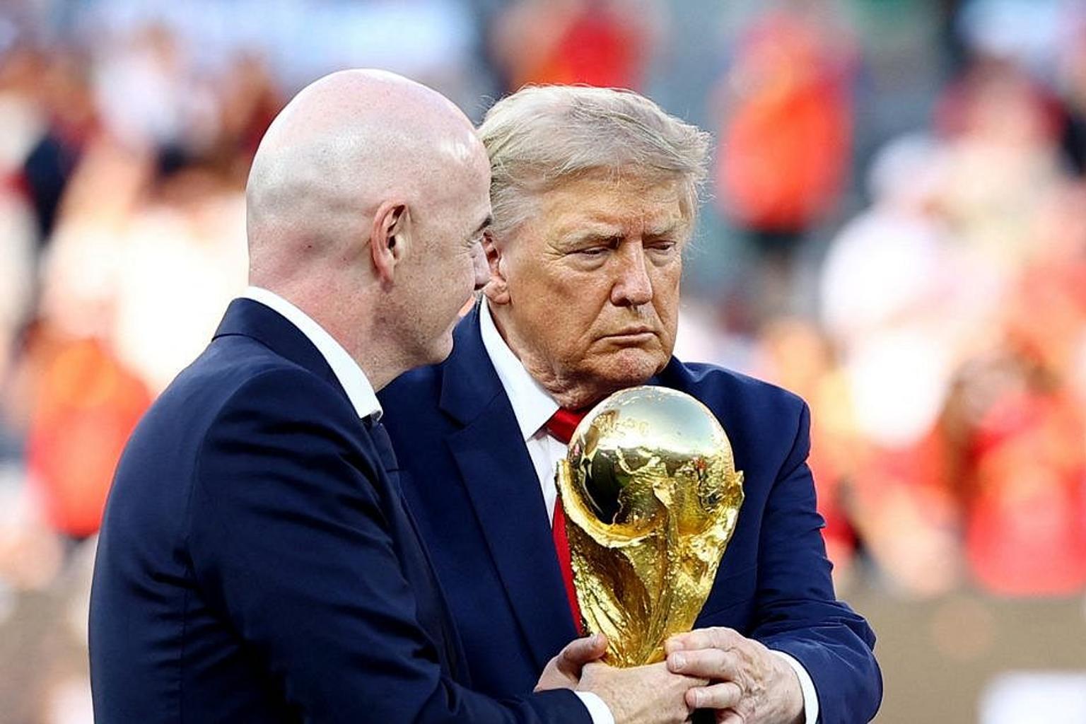 Donald Trump and Gianni Infantino on field during World Cup ceremony