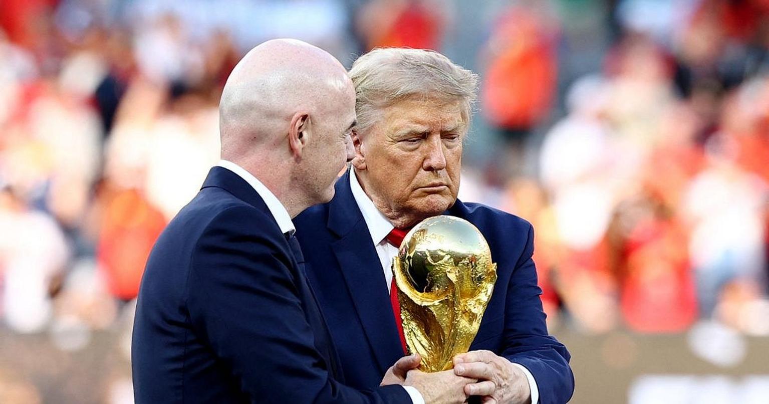 Donald Trump and Gianni Infantino on field during World Cup ceremony