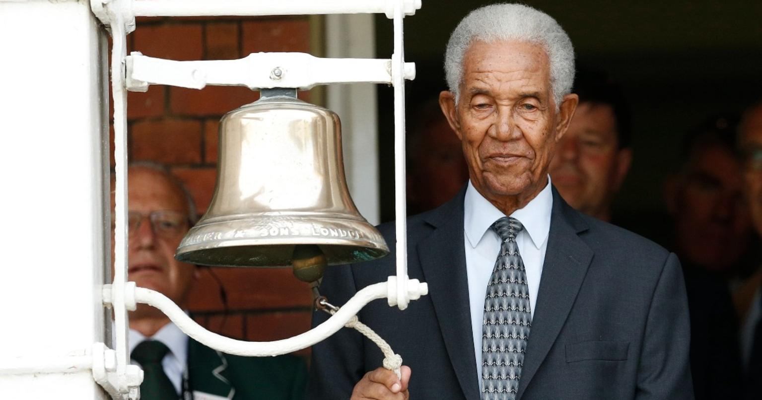 Sir Garfield Sobers in action on the cricket field with bat and ball