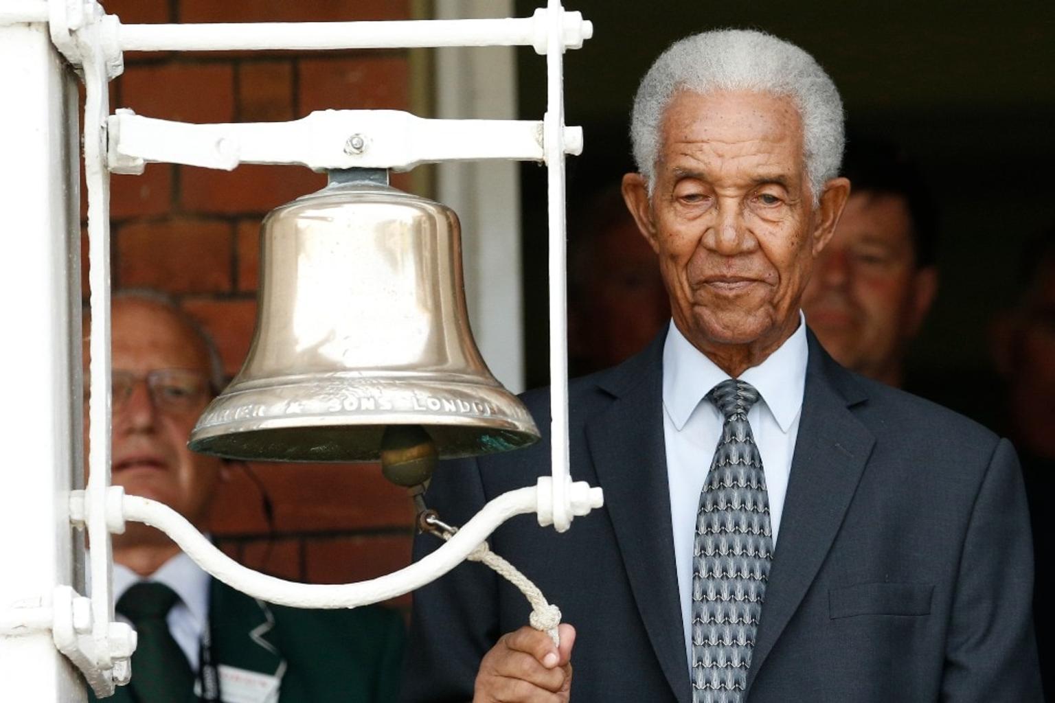 Sir Garfield Sobers in action on the cricket field with bat and ball