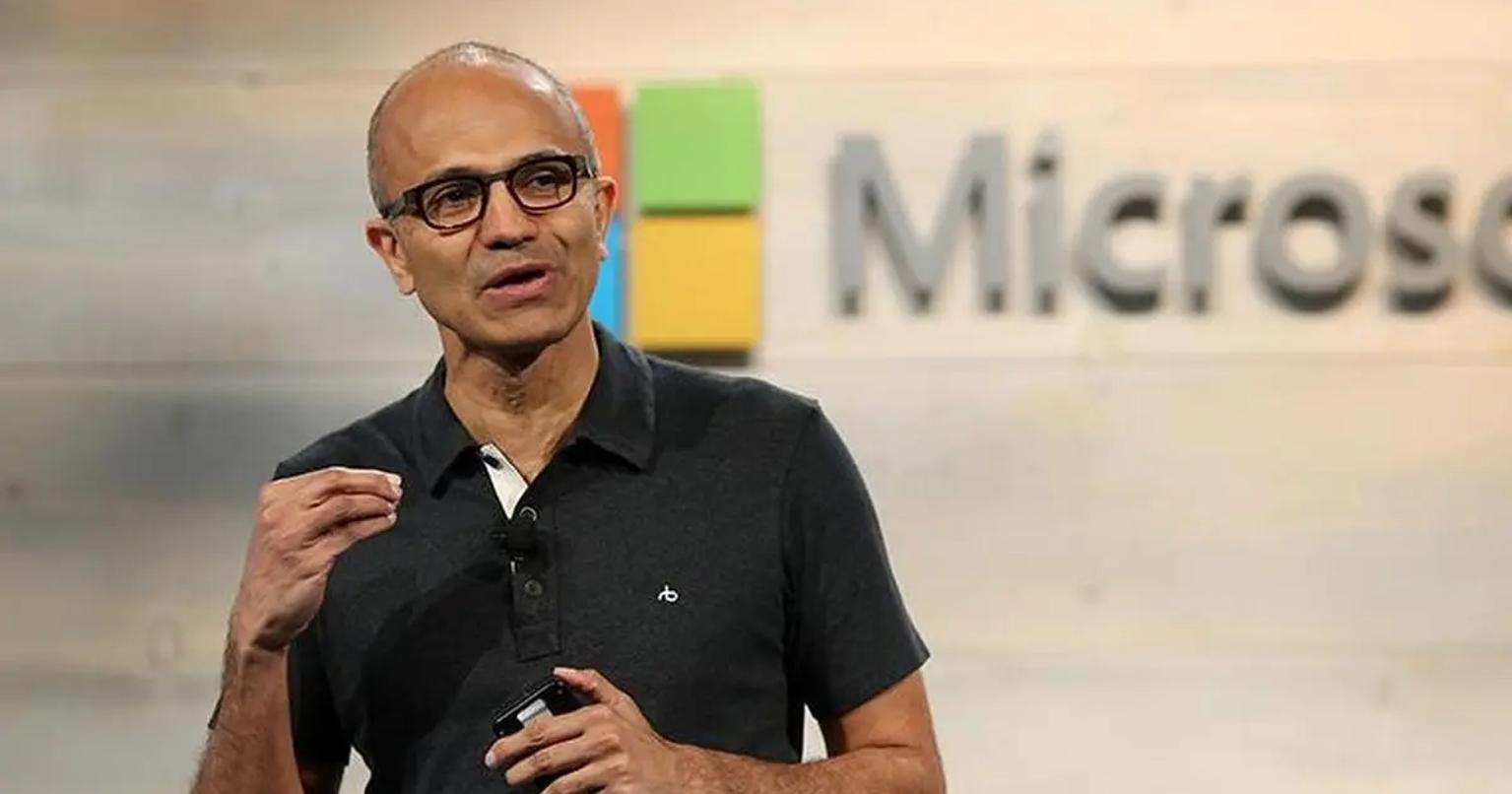 Microsoft CEO Satya Nadella speaking at a conference about AI and trust