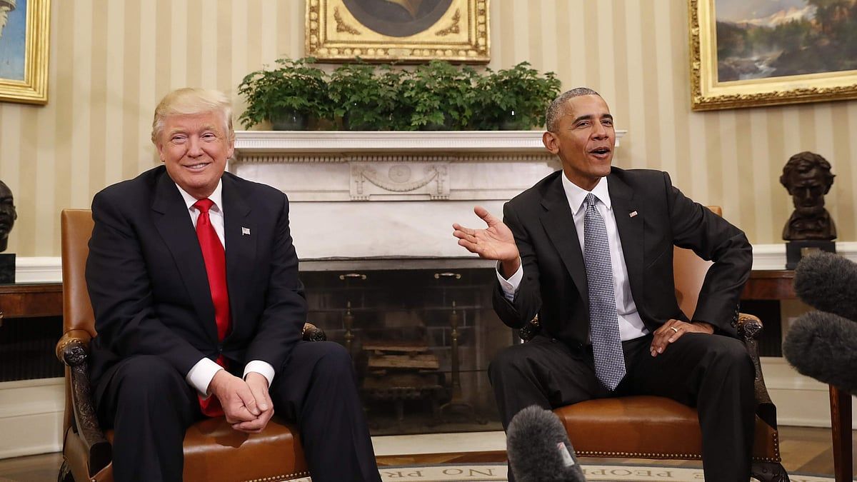 Trump posts racist doctored photo of the Obamas and Air Force One with graffiti spray-painted on plane