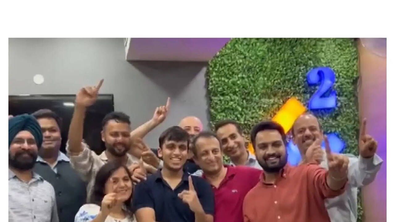 Aryan Gupta holding his NEET UG 2026 result scorecard with a smile