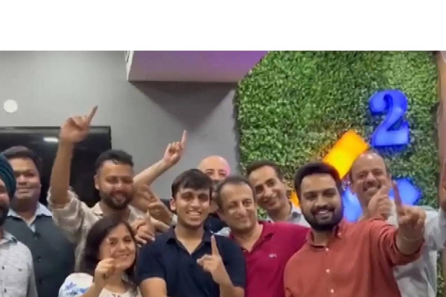 Aryan Gupta holding his NEET UG 2026 result scorecard with a smile