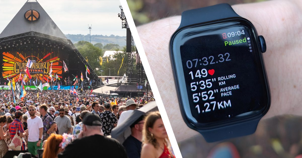 Person wearing smartwatch at a music festival