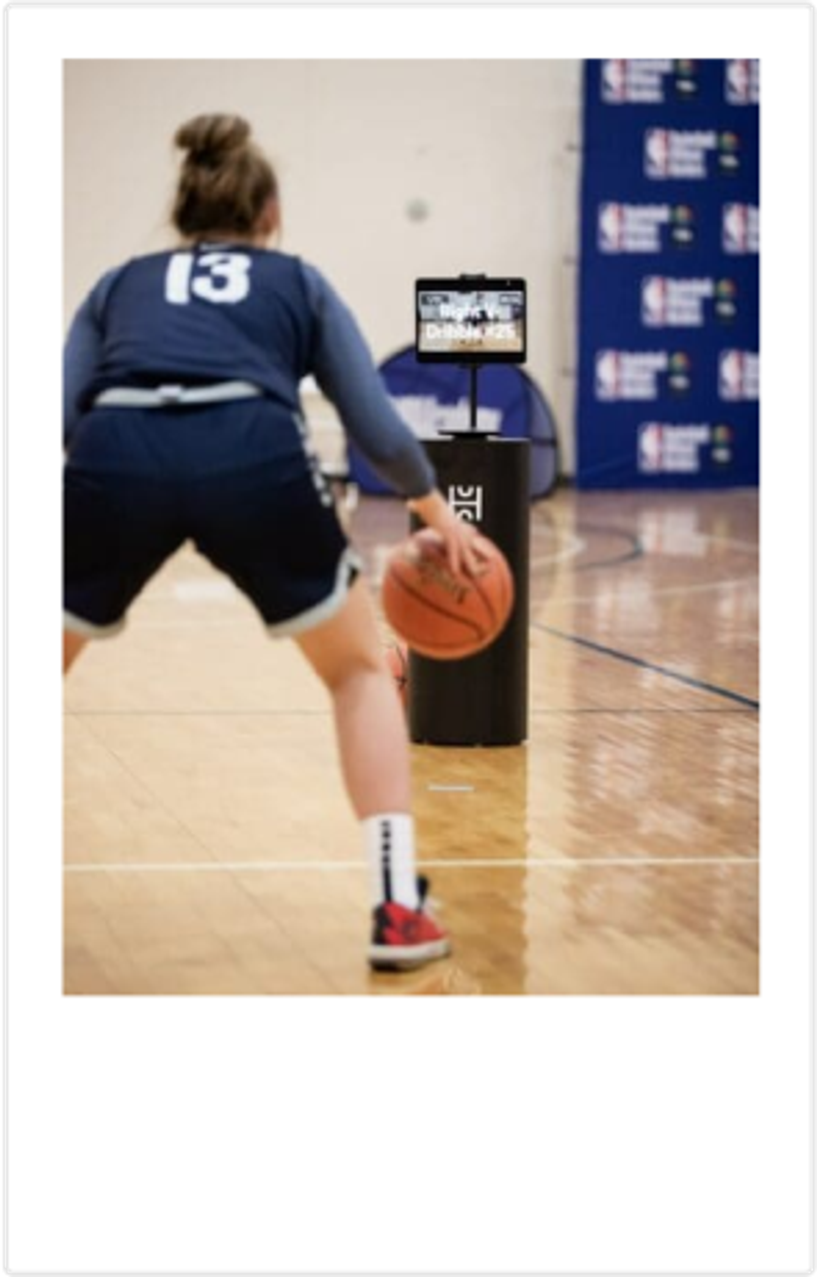 An athlete training with HomeCourt at a Jr. NBA event.
