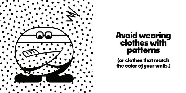 Quick Start Guide graphic advising against patterned clothing for accurate Nex Playground camera tracking.