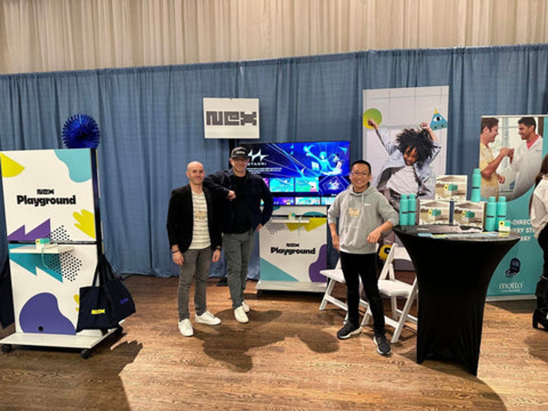 The Nex team showcasing the Nex Playground motion gaming console setup at Pepcom's Holiday Spectacular in NYC