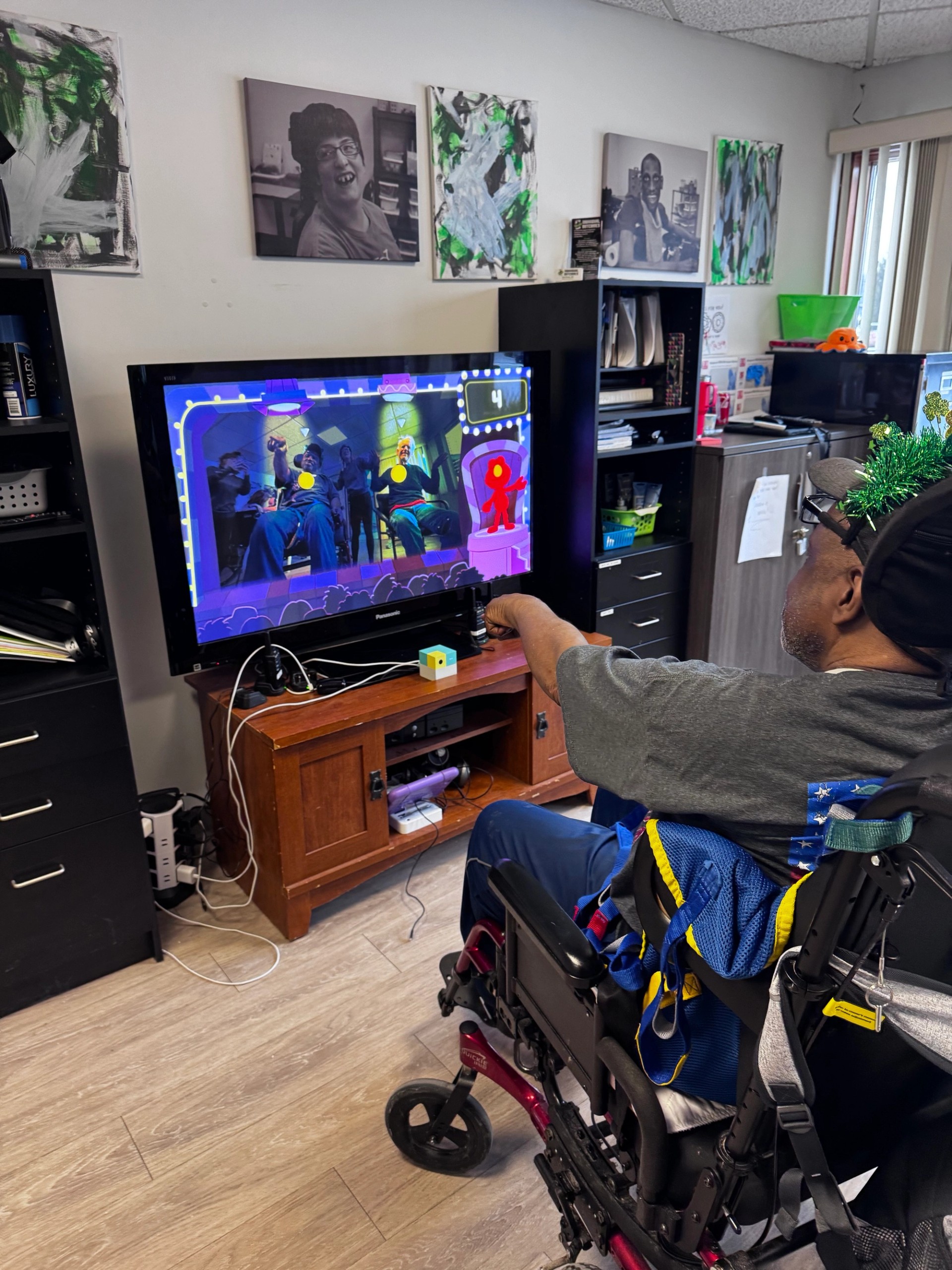 Image of older man in wheelchair playing Nex Playground