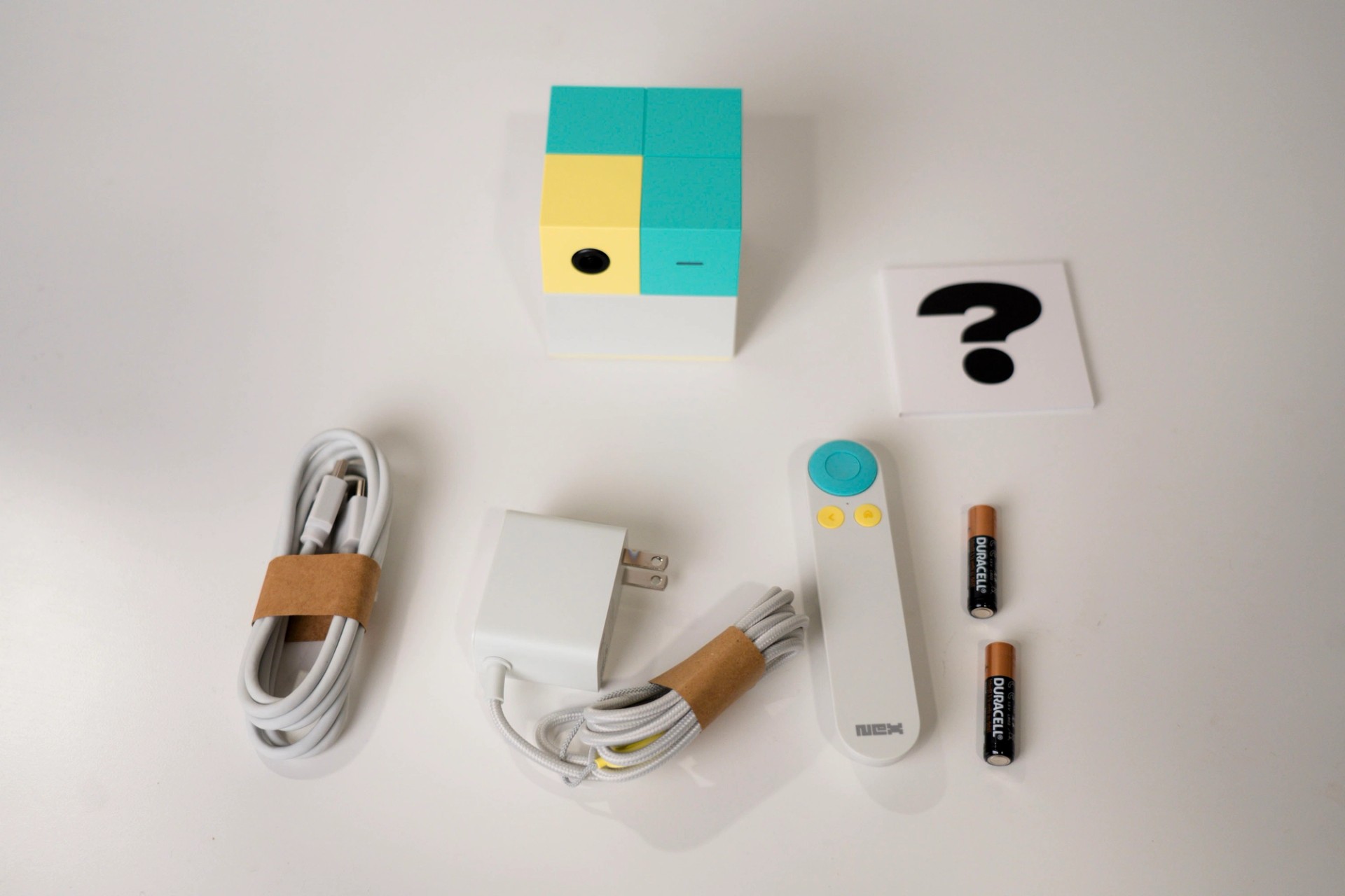 Everything included in the Nex Playground box, the console, remote, batteries, power cord, HDMI cable, and quick start guide 