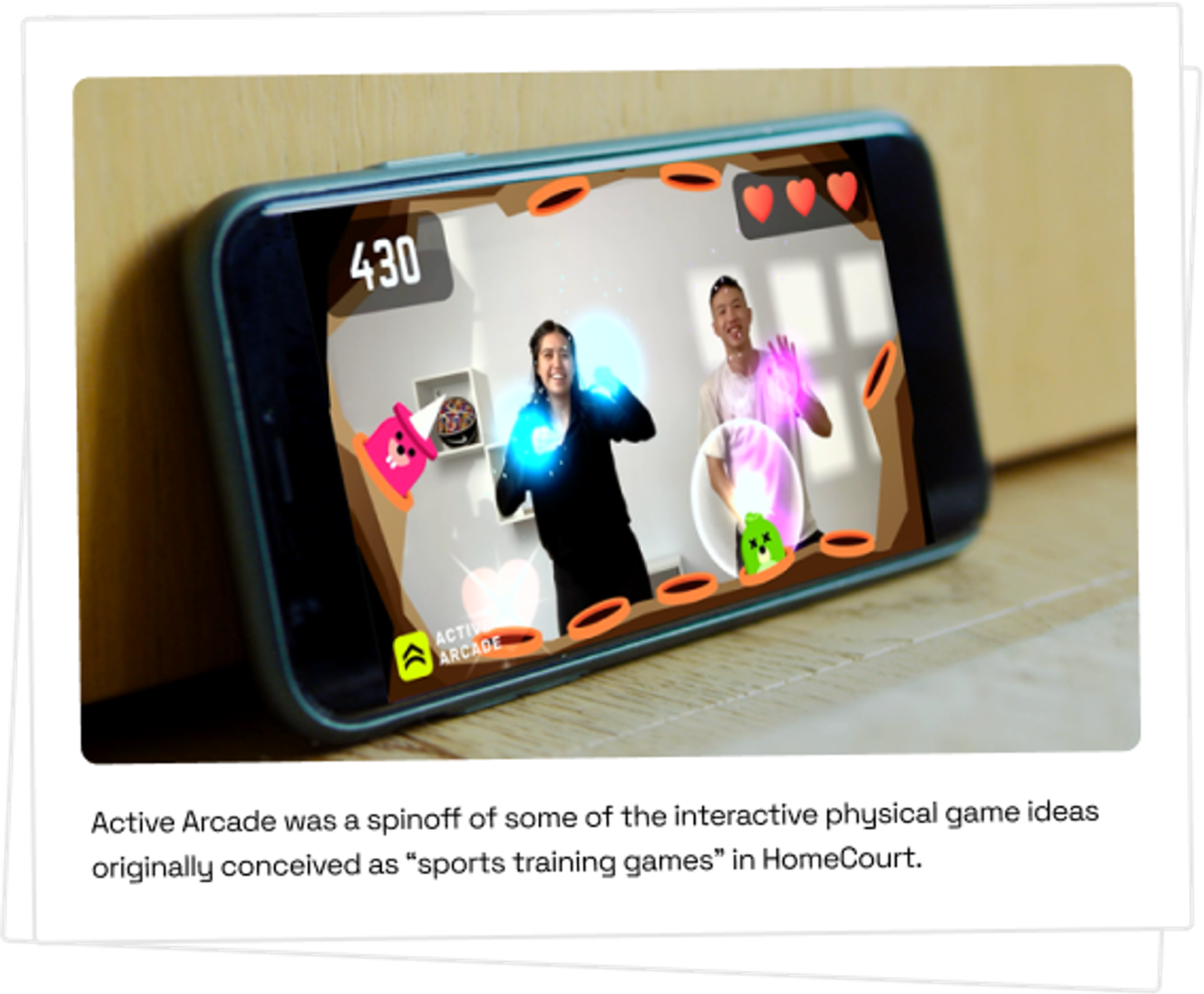 Active Arcade on an iPhone, tracking two people playing a motion game in a living room.