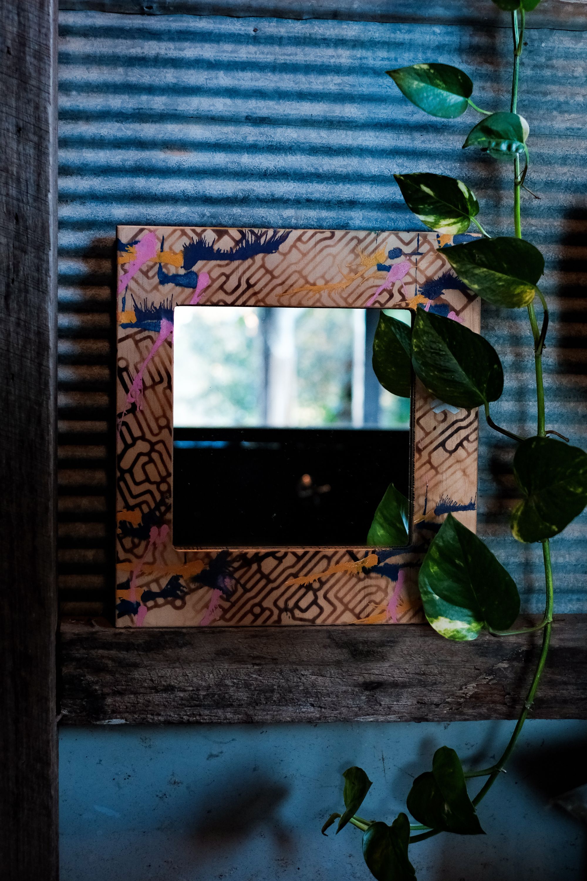 Waking up in crimson glow, a handmade mirror: crimson