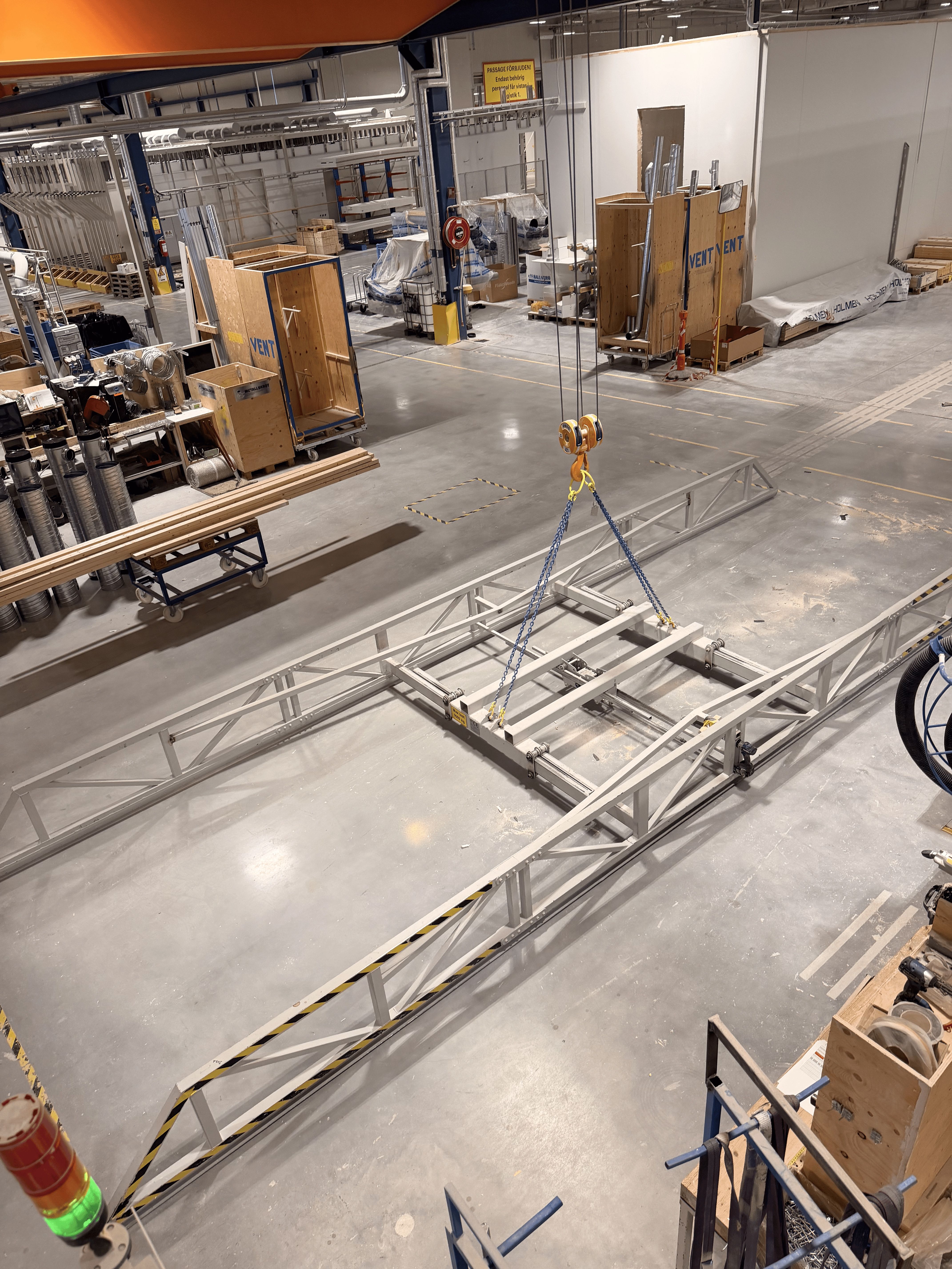 The Cassette Lift yoke hanging from the overhead crane at the Lindbäcks factory