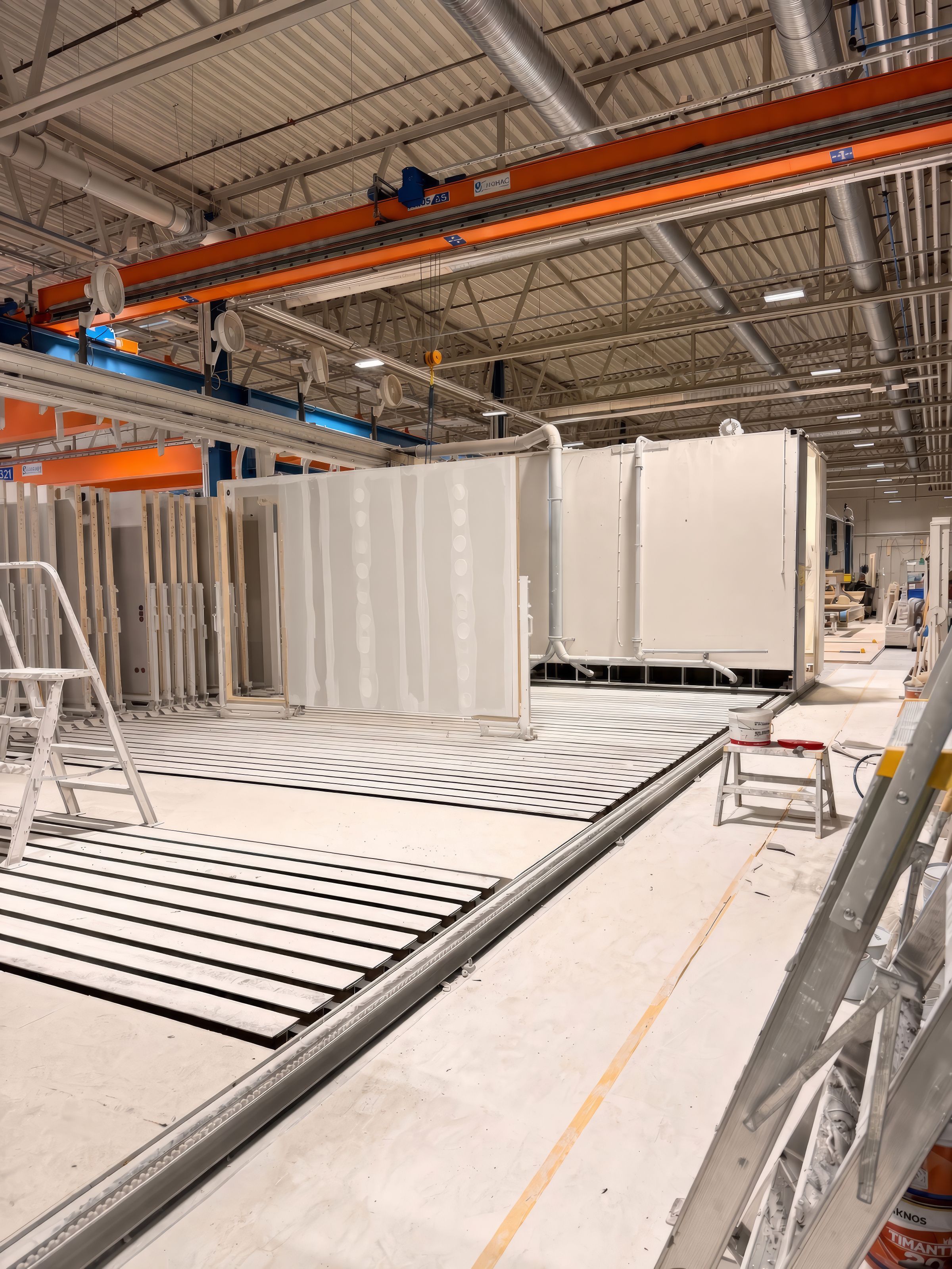 A wall on the Vertitrack Finish line beside the enclosed paint booth at the Lindbäcks factory