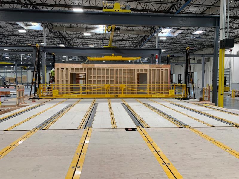 Vertiaccess Rail platforms flanking the assembly line at the Volumetric Building Companies factory