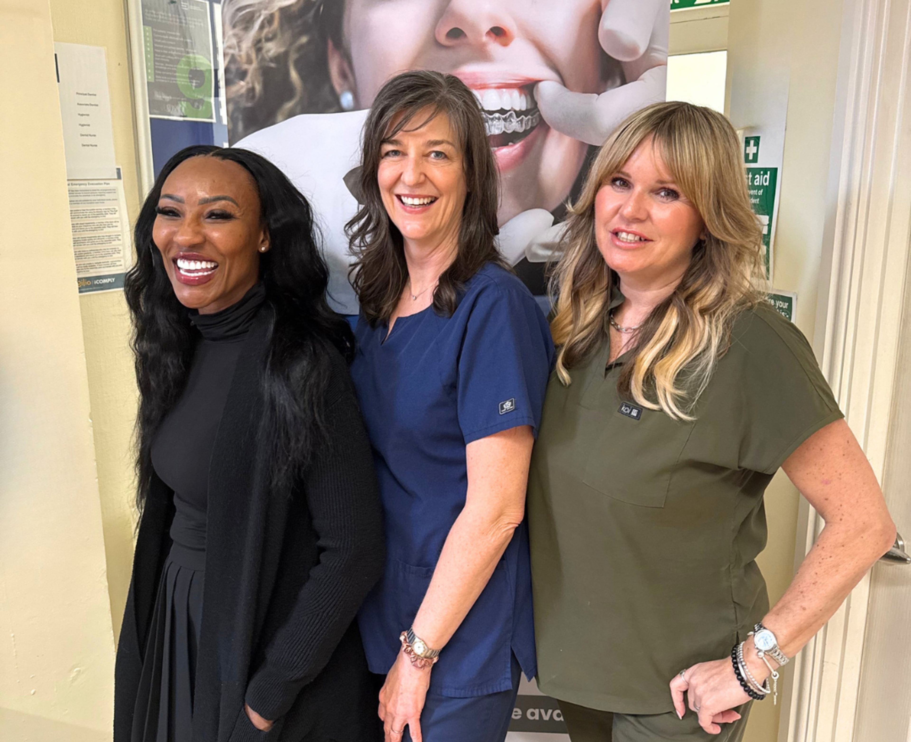 Vicki Hunter, Tamara our Practice Manager, and Nicky our receptionist, smiling together in the practice