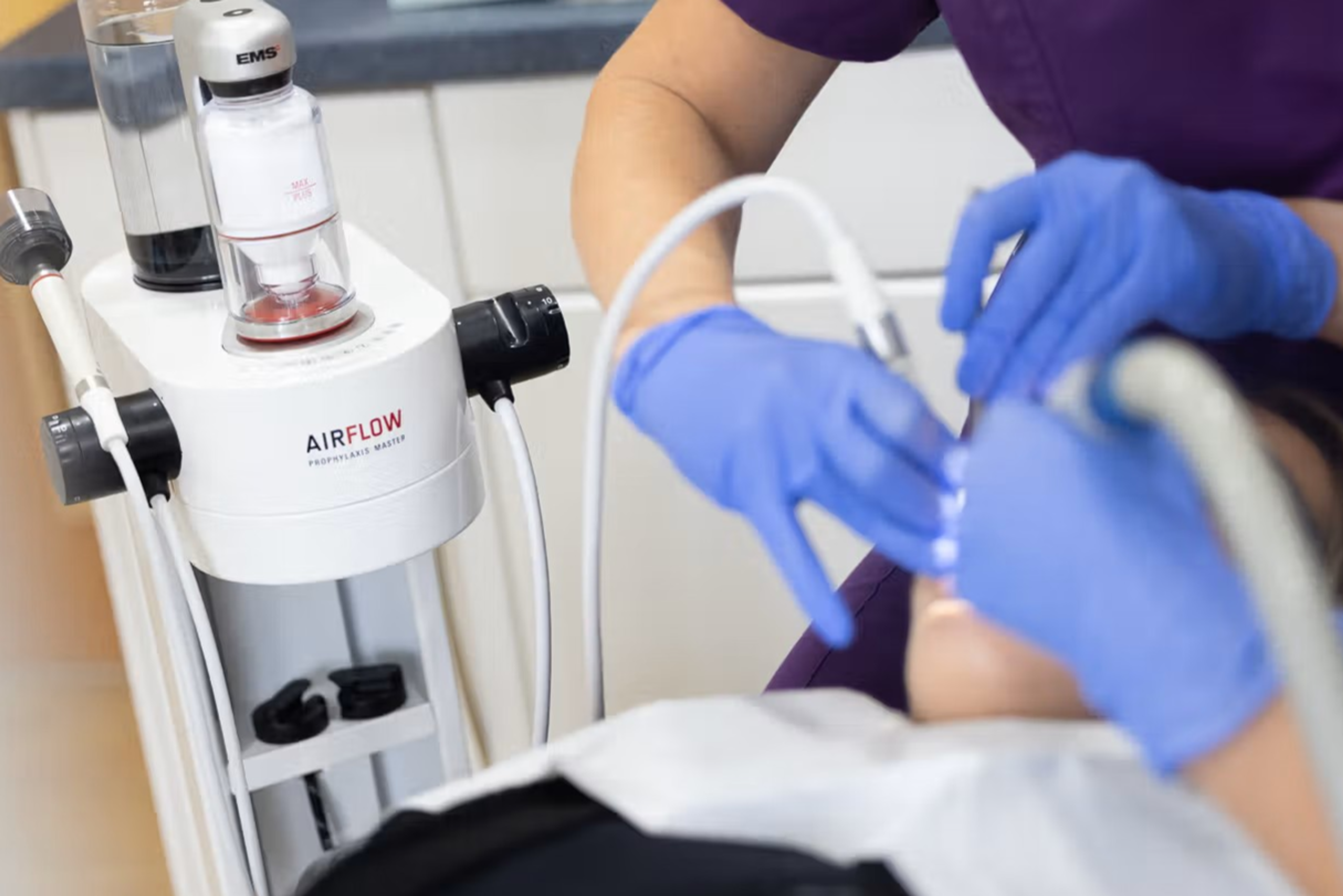 A photo of dental teeth cleaning equipment for guided biofilm therapy