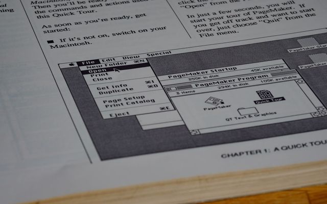 white printer paper on brown wooden table