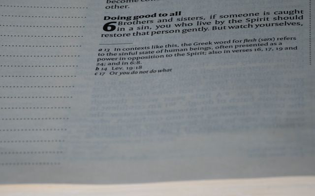 A close up of an open book with text