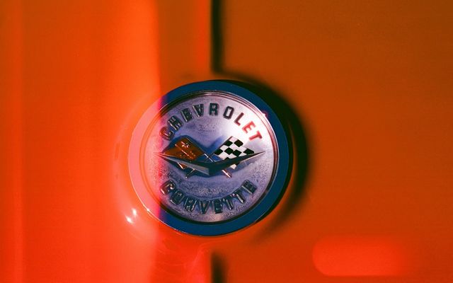 Chevrolet corvette emblem on orange background