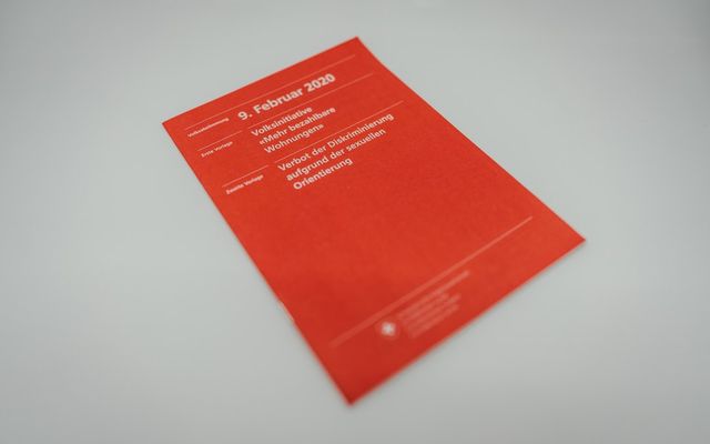 red book on white table