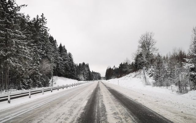 Cars driving on a snowy winter road